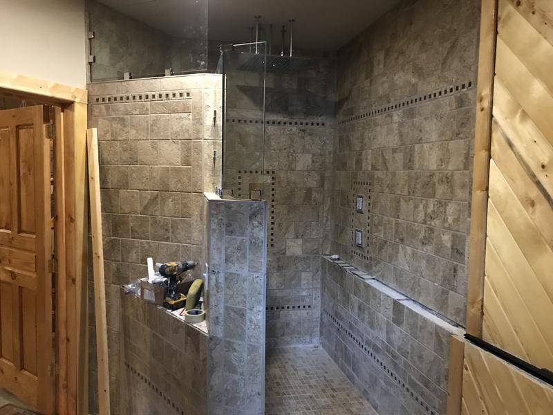 Tile shower with a half wall