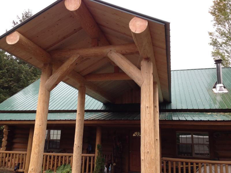 Log entry roof on a log home