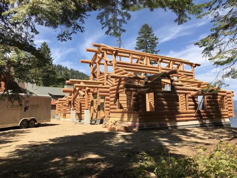 Log walls and trusses going up on site